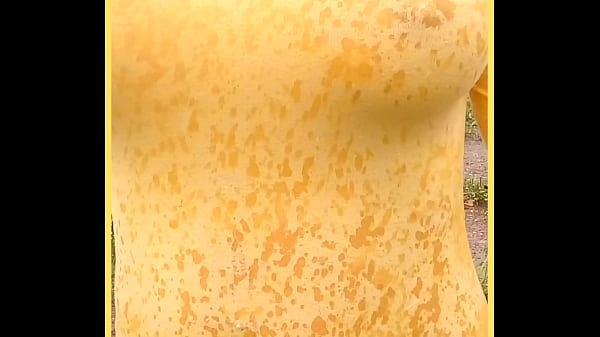 MILF wears see through shirt in the rain  perfect tits on show