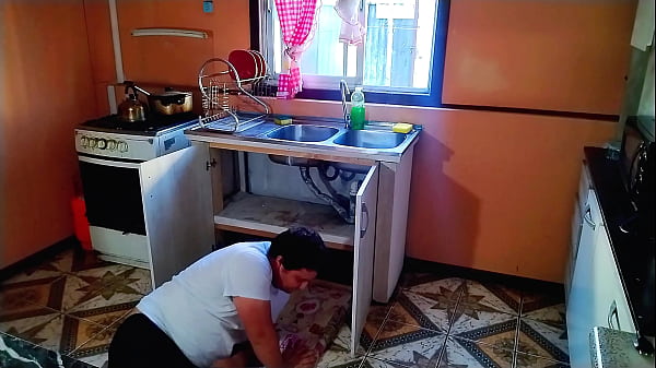 A horny woman seduces the plumber.