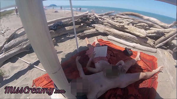 Risky Public Handjob on the Canary Beach Caught reading a book – MissCreamy