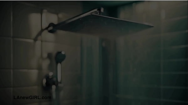 Sexy brunette model enjoys a sensual bath