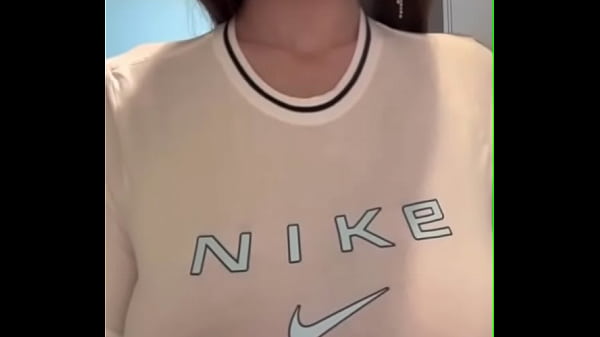 The stepmother shakes her milky tits in a tank top